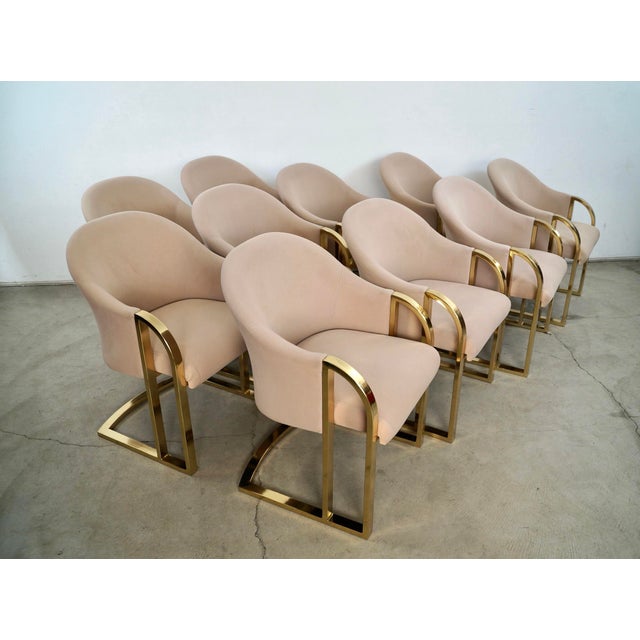 Set of ten Mid century Modern dining chairs for sale. These are original designer arm chairs from the 1970's, and are in...