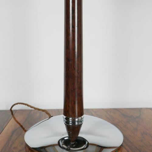 An art deco dome lamp with a mottled brown bakelite stem over a circualr chrome metal base. Chromed metal mushroom shade...