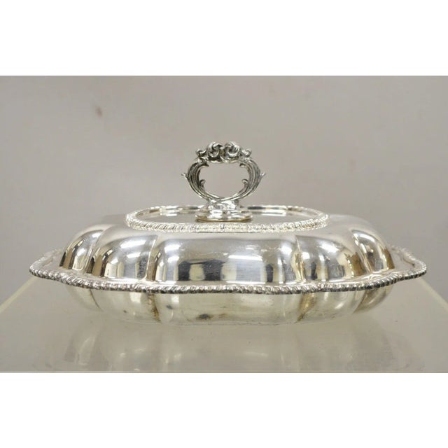 Vintage Regency Style Silver Plated Covered Vegetable Dish Serving Platter. Item features ornate scalloped lid, ornate...