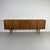 Teak Gigant sideboard designed by Nils Jonsson for Troeds (Sweden). with 4 sliding doors and 4 drawers in the centre, one...
