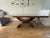 Sculptural, extendable wooden dining table attributed to Italian craftsman P. Costantini originally purchased secondhand...