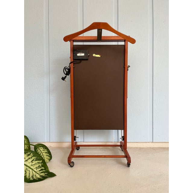 SPECIALISED with heated electric trouser press and jacket valet and it works! Beautiful vintage wooden clothes rack/ Valet...
