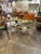 The Pair of Jansen Manner Brass and Black Glass Tables is a stylish and elegant addition to any living room. Ideal for...