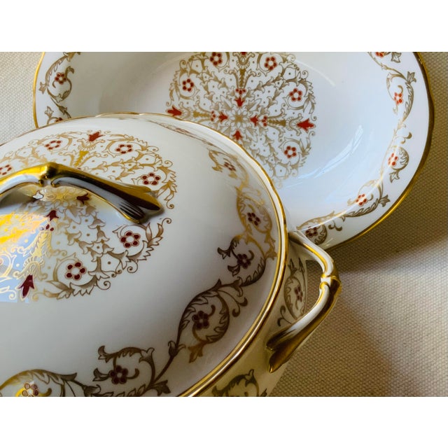 …A breathtaking pair of Royal Chelsea serving bowls in the legendary "Cardinal" pattern, representing the absolute...