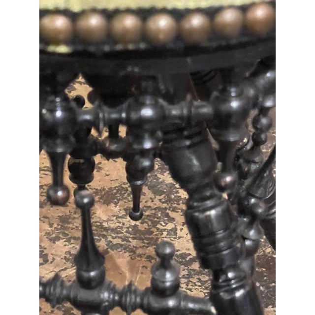 This decorative English Regency Ebonized Stool with Scalamandre Tiger Velvet is a luxurious piece of furniture . With its...