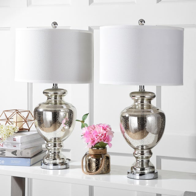 Inspired by collectible colored glass vases and bottles, the clear mercury glass table lamp is a perfect accessory for...