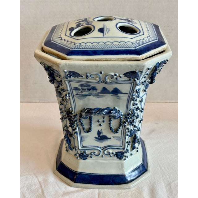 A fine Chinese antique bough pot with beautiful blue and white color and hand painted pagodas. The pot is whimsically...