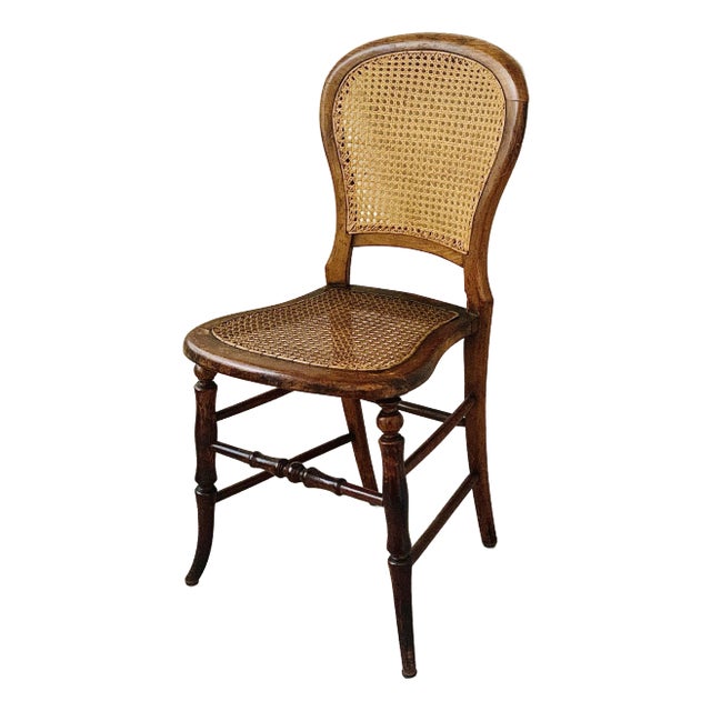 Early 20th Century Vintage Petite Boudoir Chair, Turned Fruitwood Legs and Stretcher With Balloon Caned Back and Seat, in the Style of Louis XVI For Sale