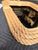 Coastal bohemian mirror featuring a warm woven jute rope frame with softly rounded corners and layered detailing. A...