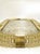 Impressive scenographic wall mirror in unlaquered brass elements with trasparent ando gold leaf inside working in...