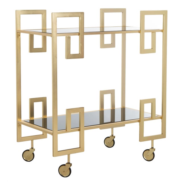A contemporary classic, this 2-tier bar cart was designed to add modern luxury to any room. it's timeless Greek key design...