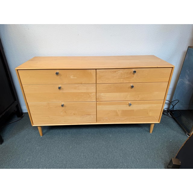 Design Plus Gallery present the Larssen Dresser from Vermont Furniture Designs for Copeland. The dresser has a mid-century...