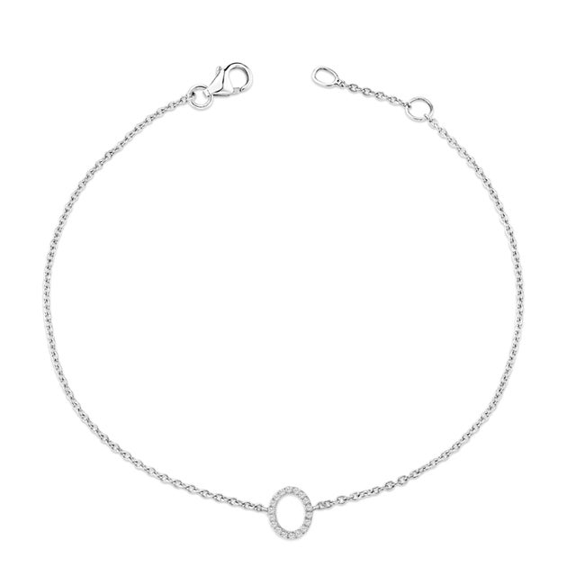 Immerse yourself in the understated elegance of this 10K white gold bracelet, rhodium-plated for an enrapturing shimmer...