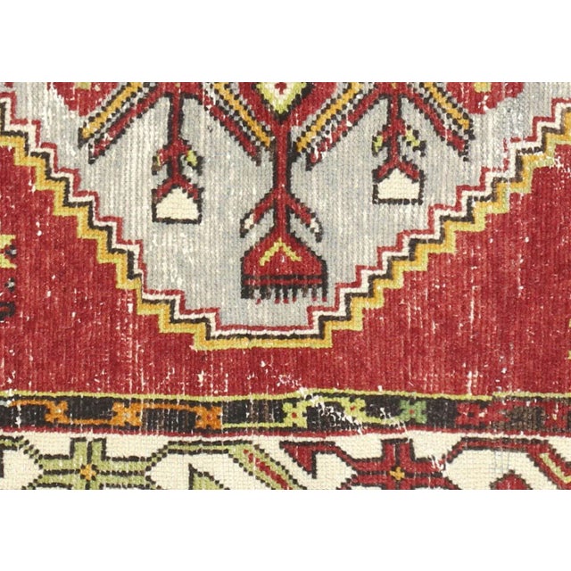 1960s Turkish Oushak Rug. Handwoven with wool on wool foundation in the Oushak region of Western Turkey. The Anatolian...