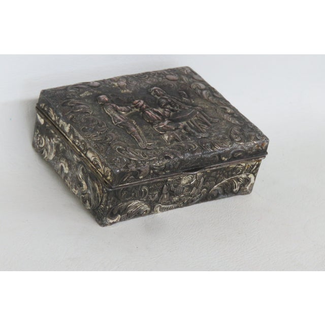 This beautiful Japanese Jewelry Box is made of metal. This wonderful Trinket Box features an ornately embossed pattern...