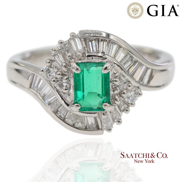 Platinum 900 Natural Diamond and Emerald Ring Metal Type: Solid Platinum 900 Total Item Weight: 7.4 Grams Ring Size: 6.5...