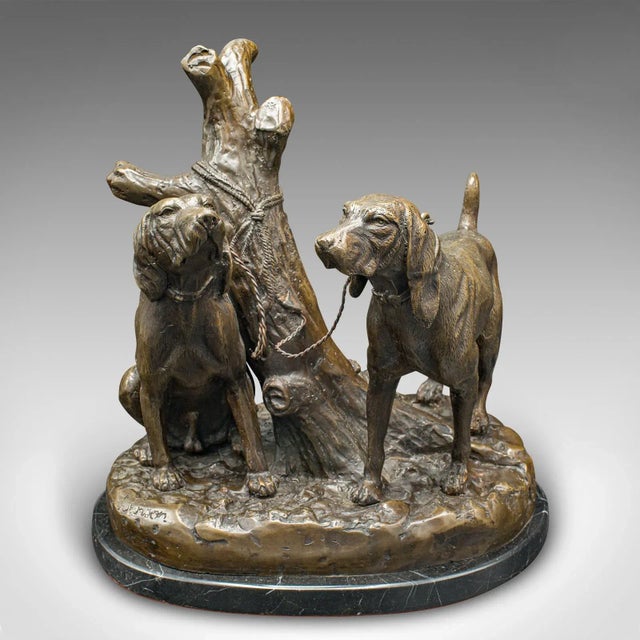 This is a heavy vintage bloodhound ornament. An American, bronze and marble figural dog sculpture by Grace Mott Johnson,...