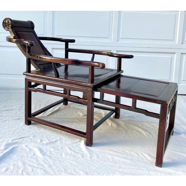 Here is an extremely rare and exceptional Asian Ming chair that has hand carved wood details and a fantastic lounging...
