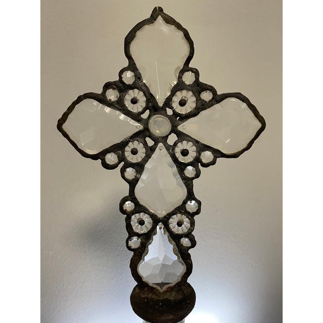 This one-of-a-kind assemblage sculpture pairs a tall clear glass bottle with an ornate handcrafted cross formed from...