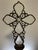 This one-of-a-kind assemblage sculpture pairs a tall clear glass bottle with an ornate handcrafted cross formed from...