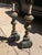 Pair of antique carved and painted wooden lamp bases in green and yellow.