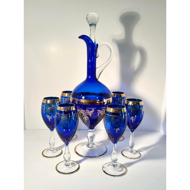 Vintage Bohemian Cobalt Glass Decanter, Clear Glass Stem, Handle and Stopper, with Six Wine Glasses, 8 Piece set. Stunning...