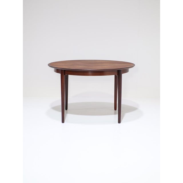 Beautiful extendable dining table, model 204 designed by Arne Vodder for Sibast in Denmark, 1960s. This dining table is...