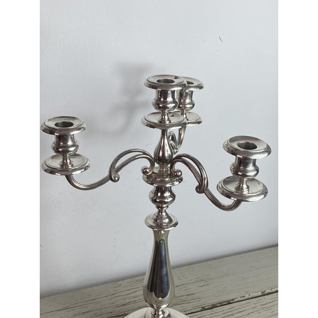 Magnificent three-branch, four-light candelabra from the French silversmith Christofle. This large candelabra, dating from...