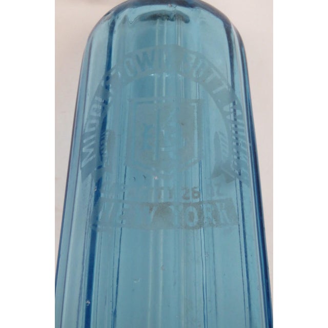 This stunning Art Deco Seltzer Bottle is made out of glass with a metal topper. This Seltzer Bottle has a brilliant...