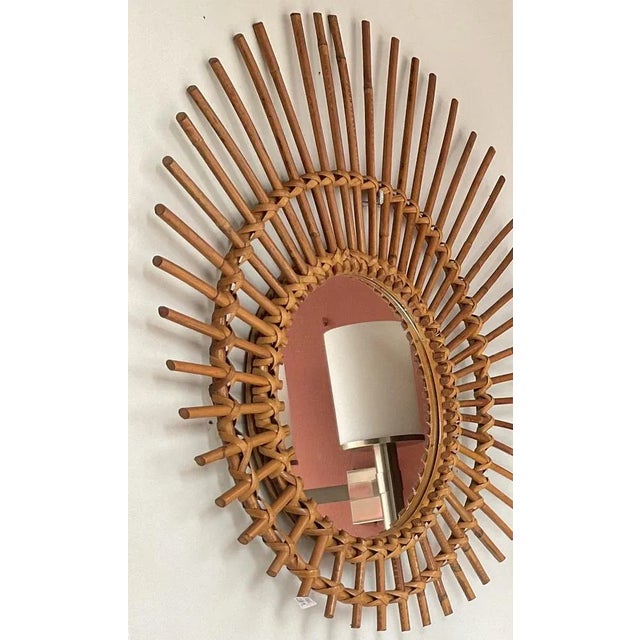 A sun mirror produced during the 1950s, featuring a mirror diameter of 23 cm, and a total diameter of about 56cm. Iconic...