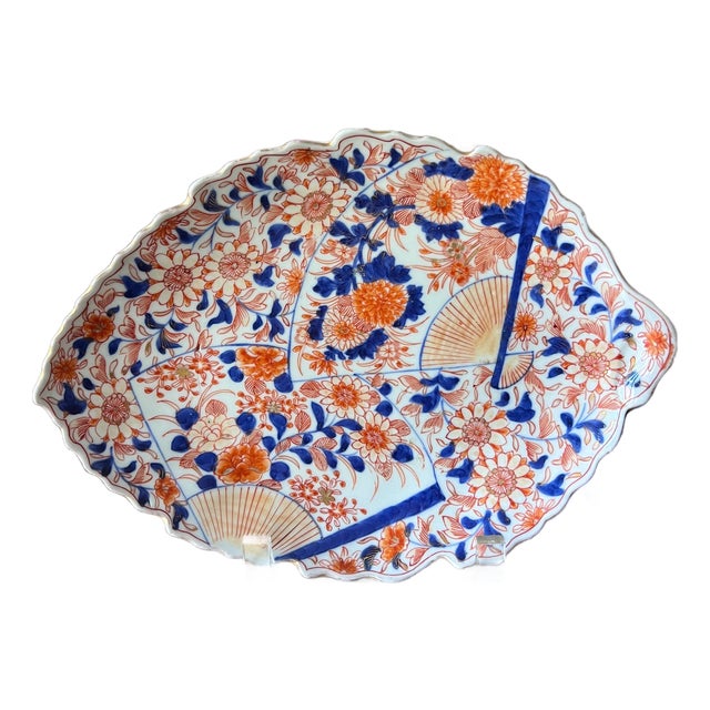 Hand-painted antique Imari leaf plate in fan and flower design // Arita plate // decorative plate // gilt edge // blue and white with orange For Sale