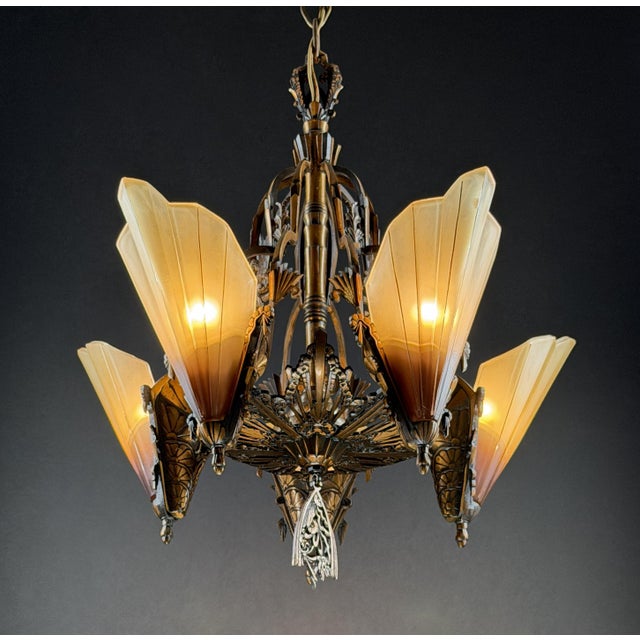 A striking example of American Art Deco lighting, this authentic Mid West Manufacturing “Soleure” Series 5-light...