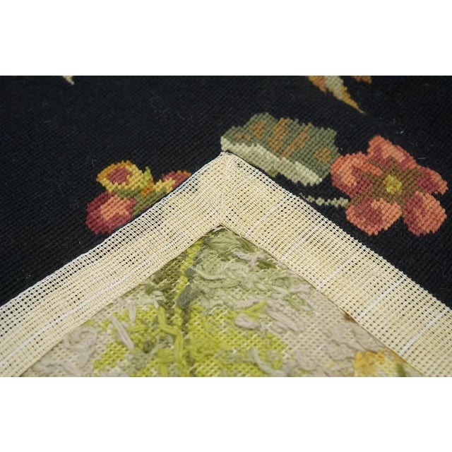 Usually English or French, often with repeating allover designs executed with wool cross-stitches. Larger carpets are...