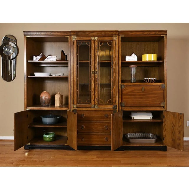 Extraordinary 3-piece Chinoiserie wall-unit by Bernhardt. This captivating Asian inspired system is comprised of three...