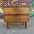This is a mid century walnut nightstand from Royal American by Stanley for Distinctive Furniture. This two drawer...