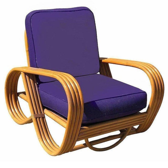 This beautifully restored living room set features a 4-Strand, 3-seat Reverse Pretzel sofa and a set of two lounge chairs....