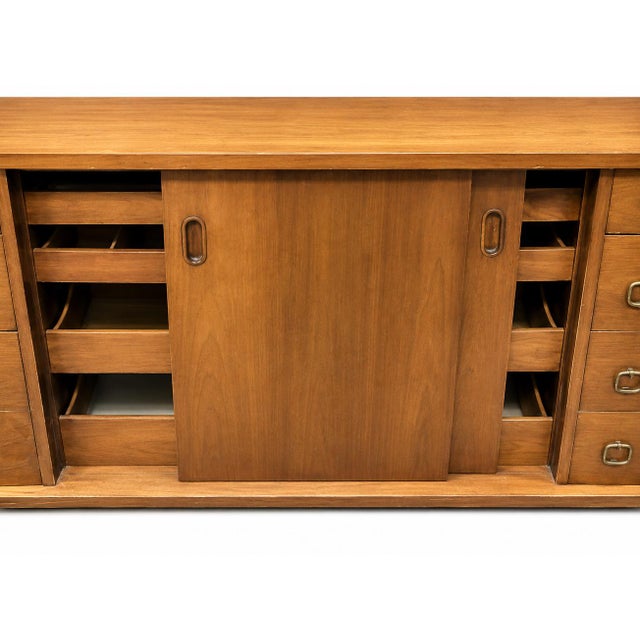 Beautiful solid wood Mid-Century Modern credenza by John Widdicomb, showcasing exceptional craftsmanship and timeless...