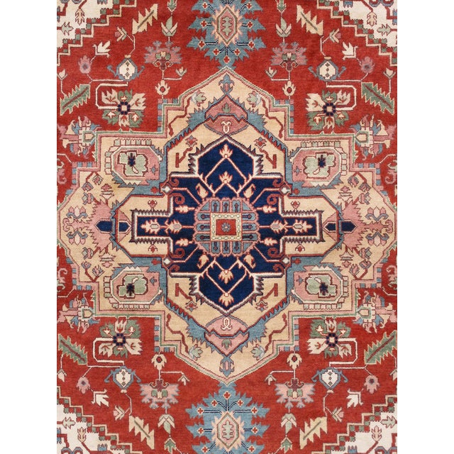 The Serapi Collection reinterprets traditional tribal geometric design through a refined palette. Each rug is hand-knotted...