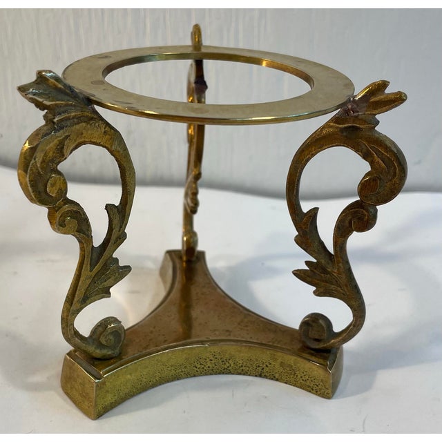 Nice vintage brass dragon stand to hold a decorative sphere, bowl or egg.