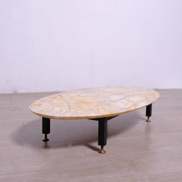 Beautiful low table, with removable marble top, metal structure and feet. Excellent furnishing accessory. Dimensions:...