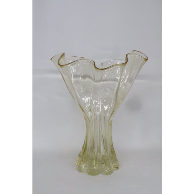 This gorgeous handkerchief vase is made of hand blown art glass and sculpted in a classic Mid-Century Modern style. It...