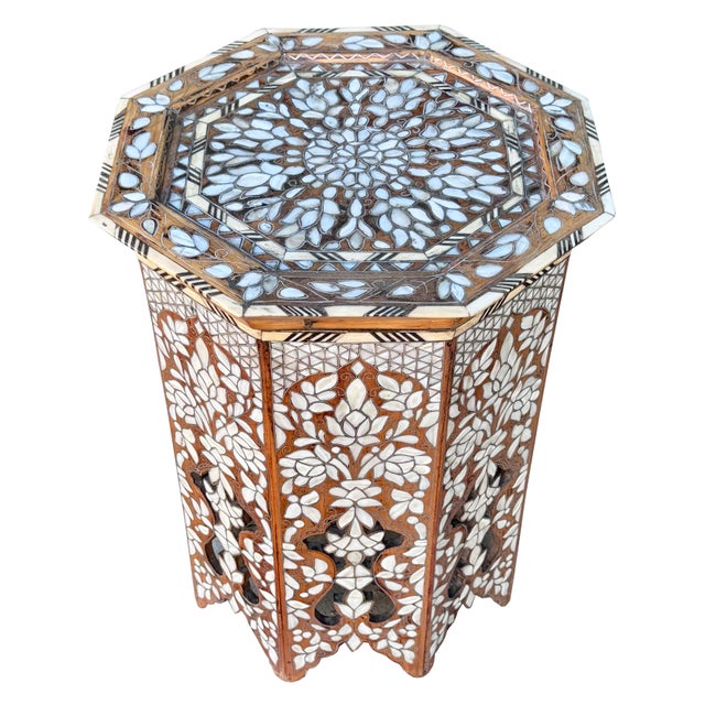 A beautifully preserved antique Syrian octagonal side table dating to the mid-19th century, handcrafted in Damascus by...