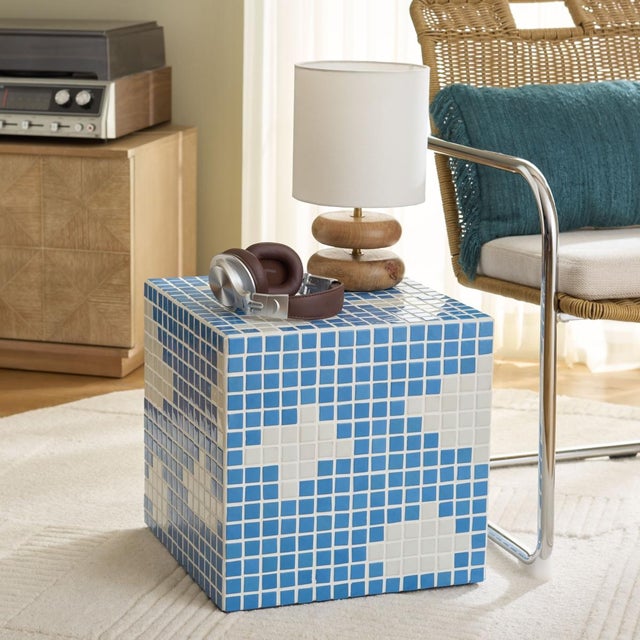 Presenting the Hikari Cube Accent Table, a true reflection of modern design aesthetics. Let this stylish piece set the...