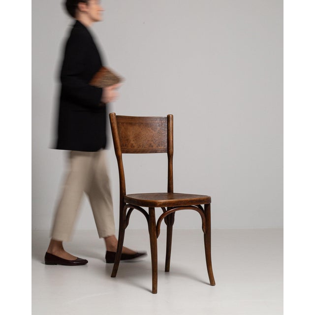 This piece presents as a panel piece, distinguished by embossed tooled floral pattern, tan brown. Dating to Early 20th...