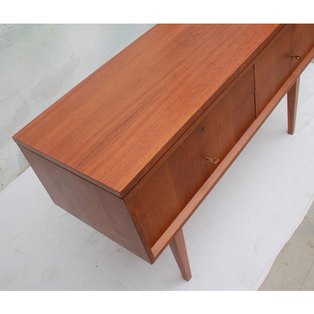 High-quality chest of drawers, veneered in walnut. This is a custom-made piece by a cabinetmaker, very high-quality...