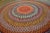 1930s 1930s Multi Background Wtih Folk Art Styles Round Antique American Braided Rug For Sale - Image 5 of 15