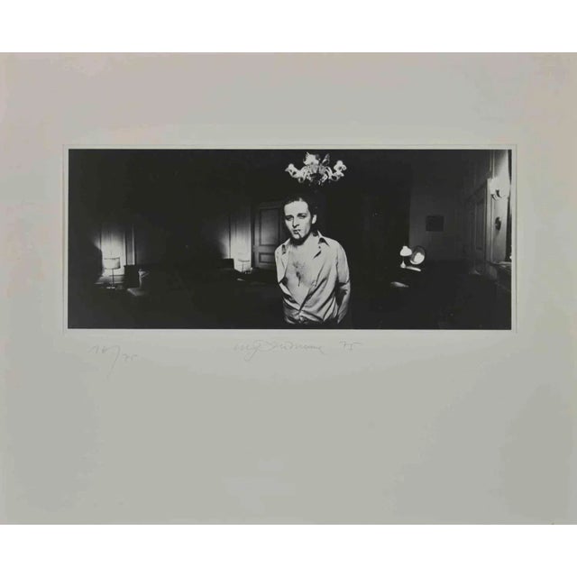 An Island in the Air is a Photograph realized by Urs Luthi in 1975. from the portfolio "Un'isola nell'aria", edition of 75...