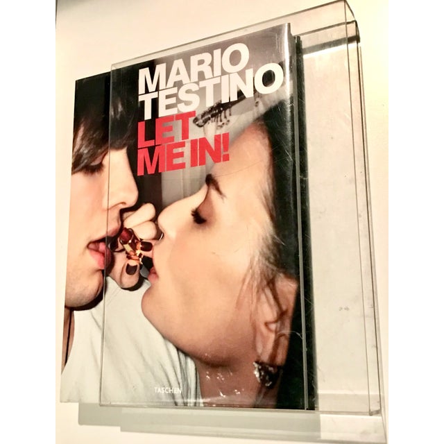 We are proud to present MARIO TESTINO. LET ME IN! Limited Collector’s Edition of 1,000. Published by Taschen, 2007. This...