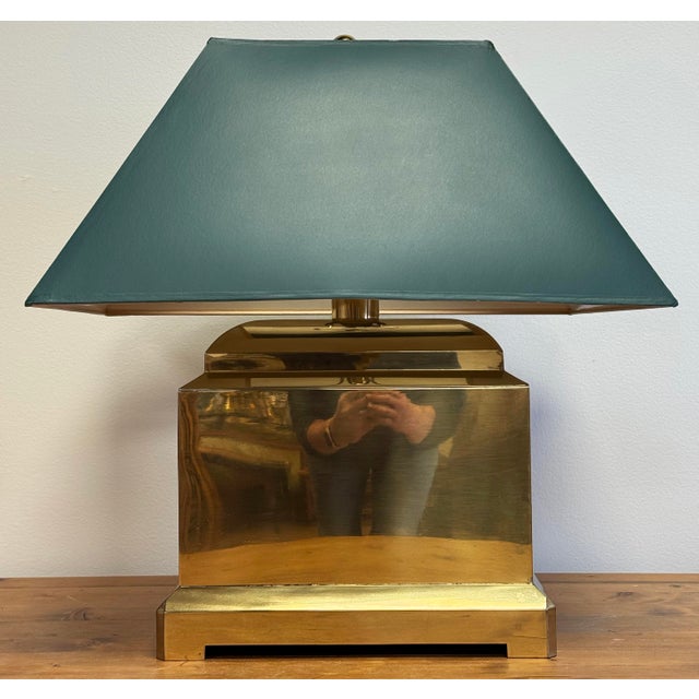 Oversized vintage rectangular brass table lamp with painted green shade. Unique chunky shape with squared footed base....