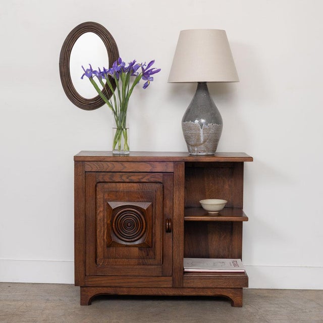 Stunning carved wood side table in the style of Charles Dudouyt from France, 1940s. Beautiful slim depth side table with...